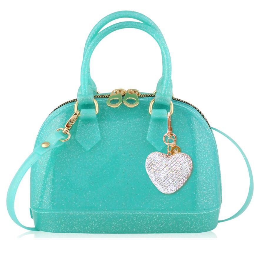 Turquoise handbag with a heart-shaped charm