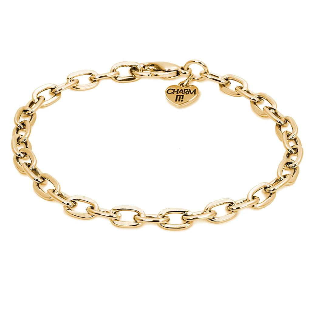A gold chain bracelet with a charm attached to it