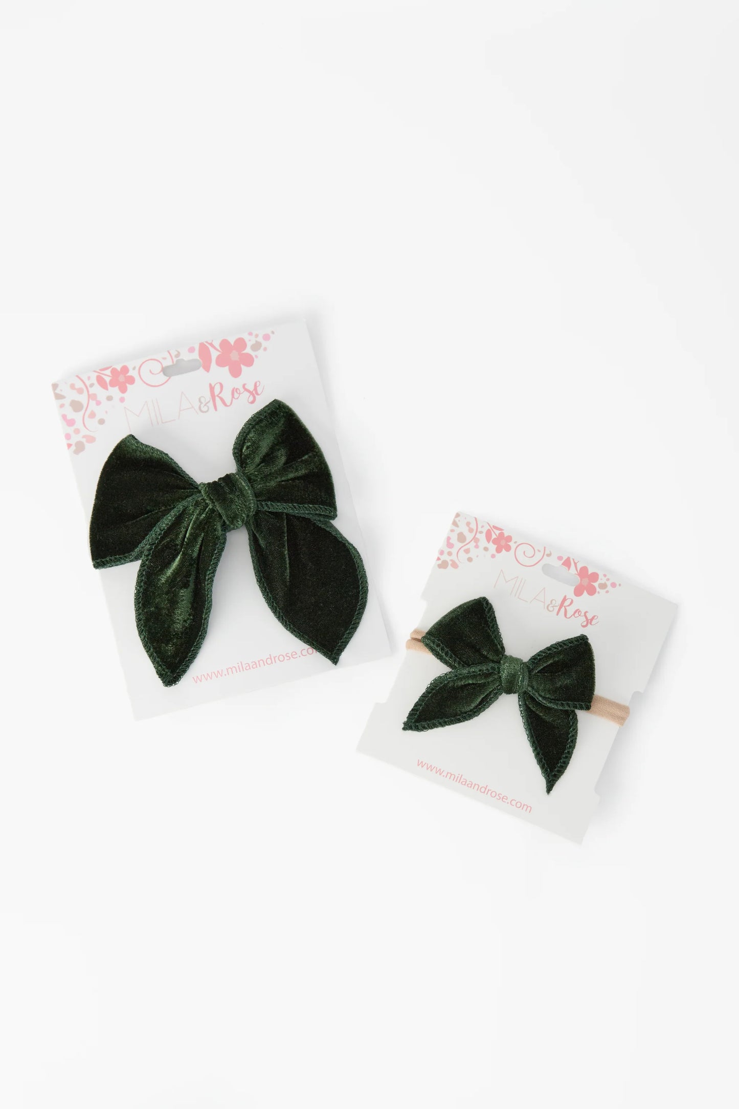 Two green velvet hair bows