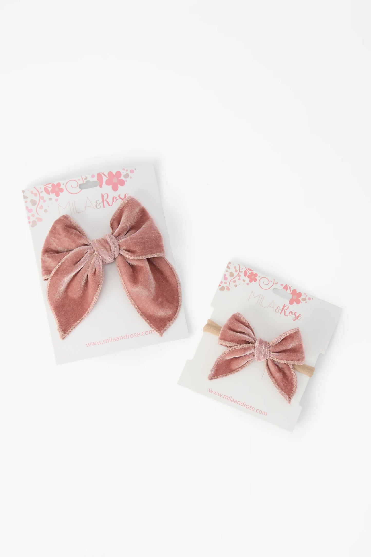 Two pink velvet hair bows
