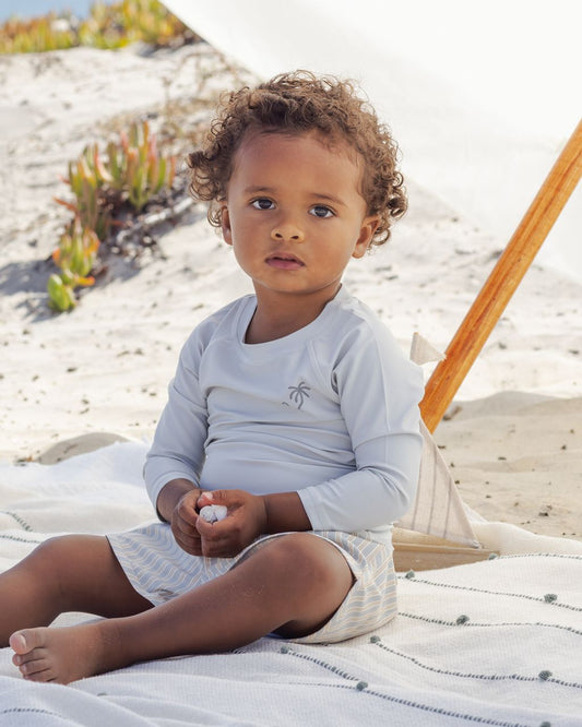 Sky Rashguard + Blue and Butterscotch Stripe Trunks