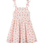 Pink floral dress on a white background