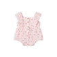 Pink floral baby romper on a white background