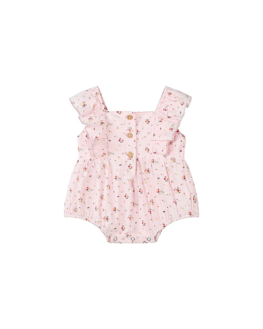 Pink floral baby romper on a white background