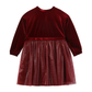 A long-sleeve children's dress in deep burgundy velvet, featuring a solid velvet bodice, a matching satin waistband, and a gathered tulle skirt with a subtle textured pattern.