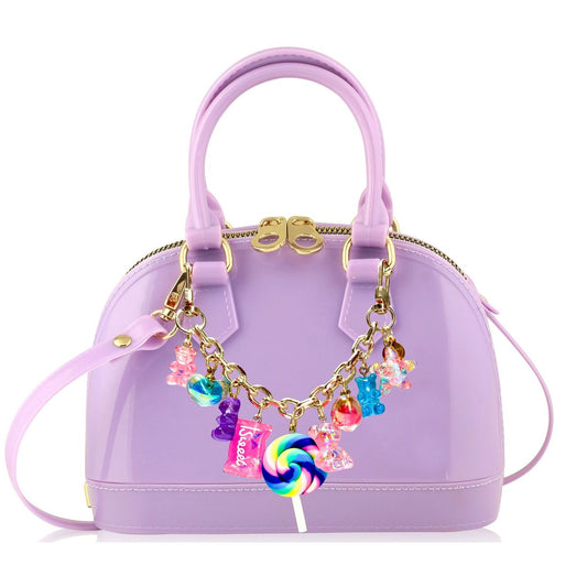 Purple handbag with colorful charm accents 