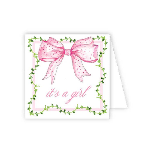 Card with a pink bow and 'it's a girl' text on a white background