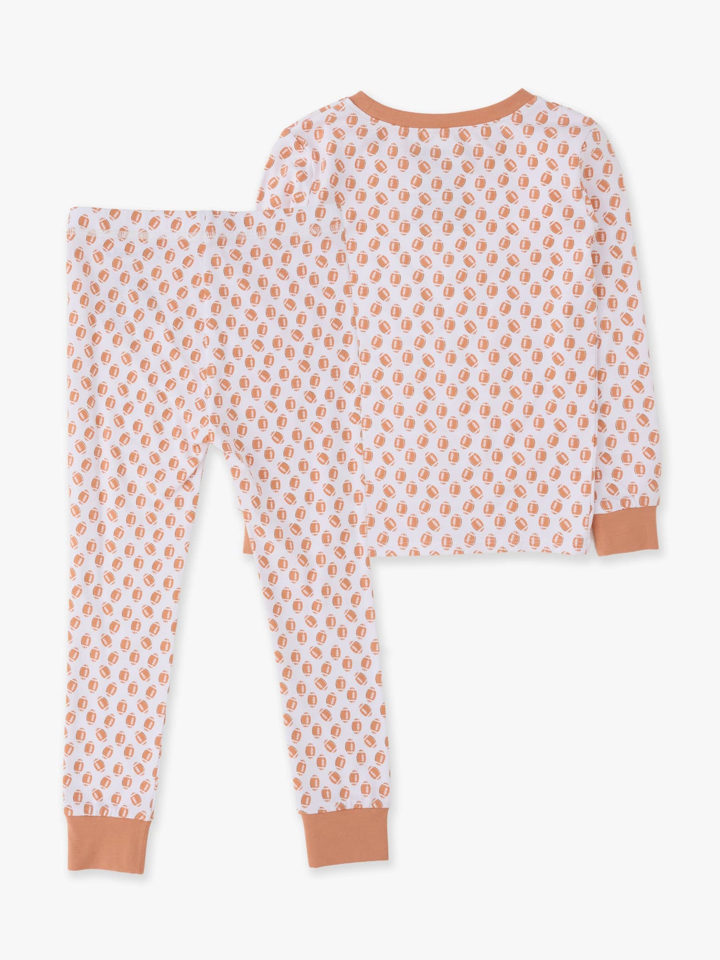 A two-piece children's pajama set featuring a long-sleeve top and matching pants in a white fabric with a repeating peach-orange paisley pattern, finished with solid peach-orange ribbed trim at the collar, cuffs, and hem.