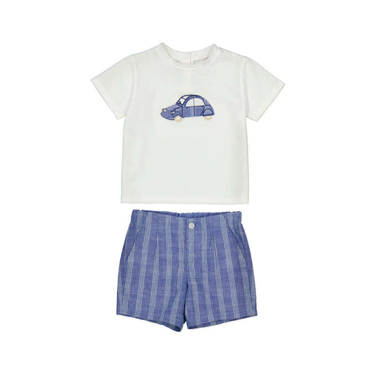 White t-shirt with blue car design and blue patterned shorts