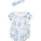 Baby romper with floral pattern and matching headband 