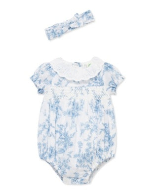 Baby romper with floral pattern and matching headband 