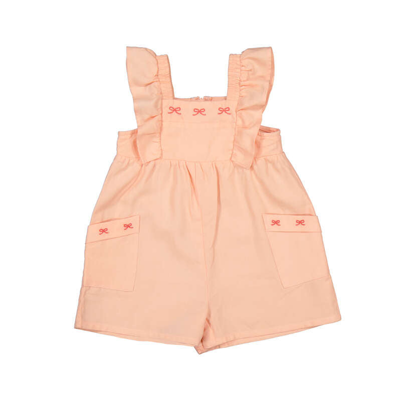 Peach-colored romper with bow 