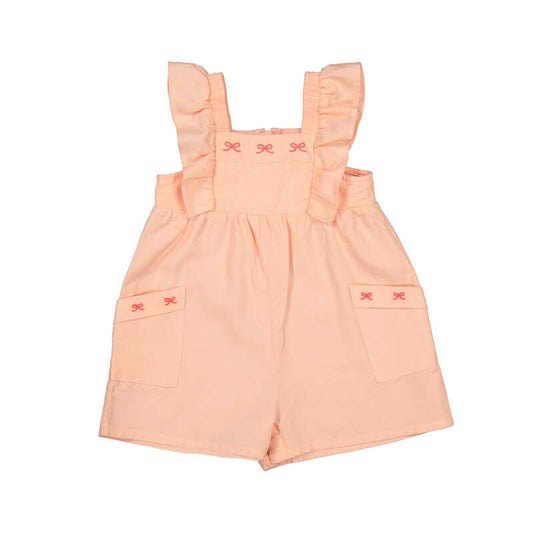 Peach-colored romper with bow 