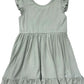 Light green dress with ruffled sleeves and bottom 