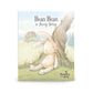 Book cover of 'Bun Bun a Lovey Story' with a plush bunny toy on a grassy background.