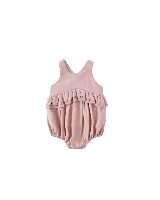 Pink baby romper with lace details