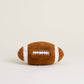 Plush football toy made to warm up
