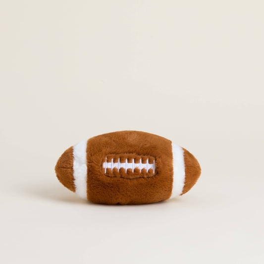 Plush football toy made to warm up