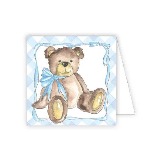Card with a teddy bear and blue bow on a white background