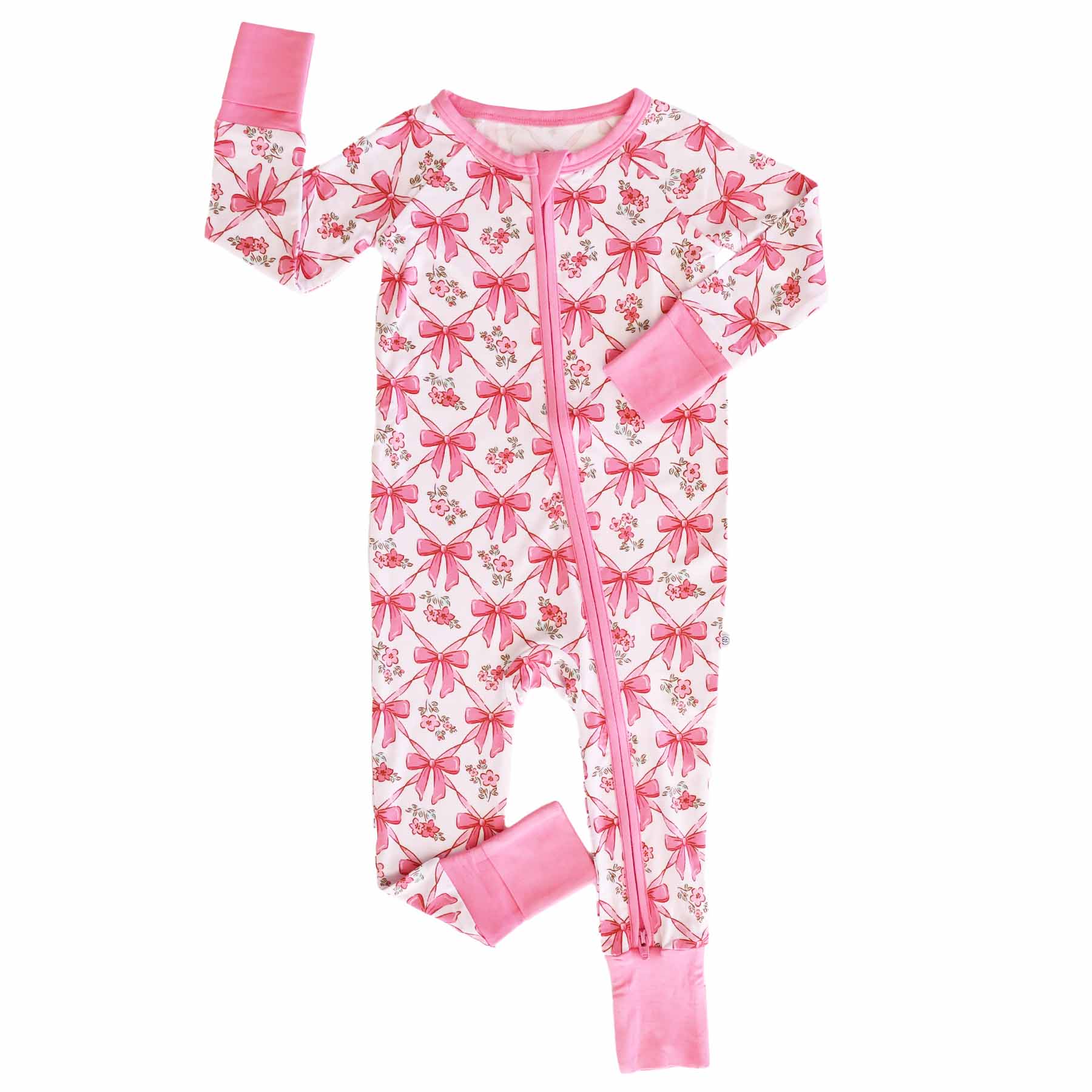 Baby sleeper with pink bow pattern