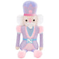 Nutcracker Plush with a purple outfit and pink accents