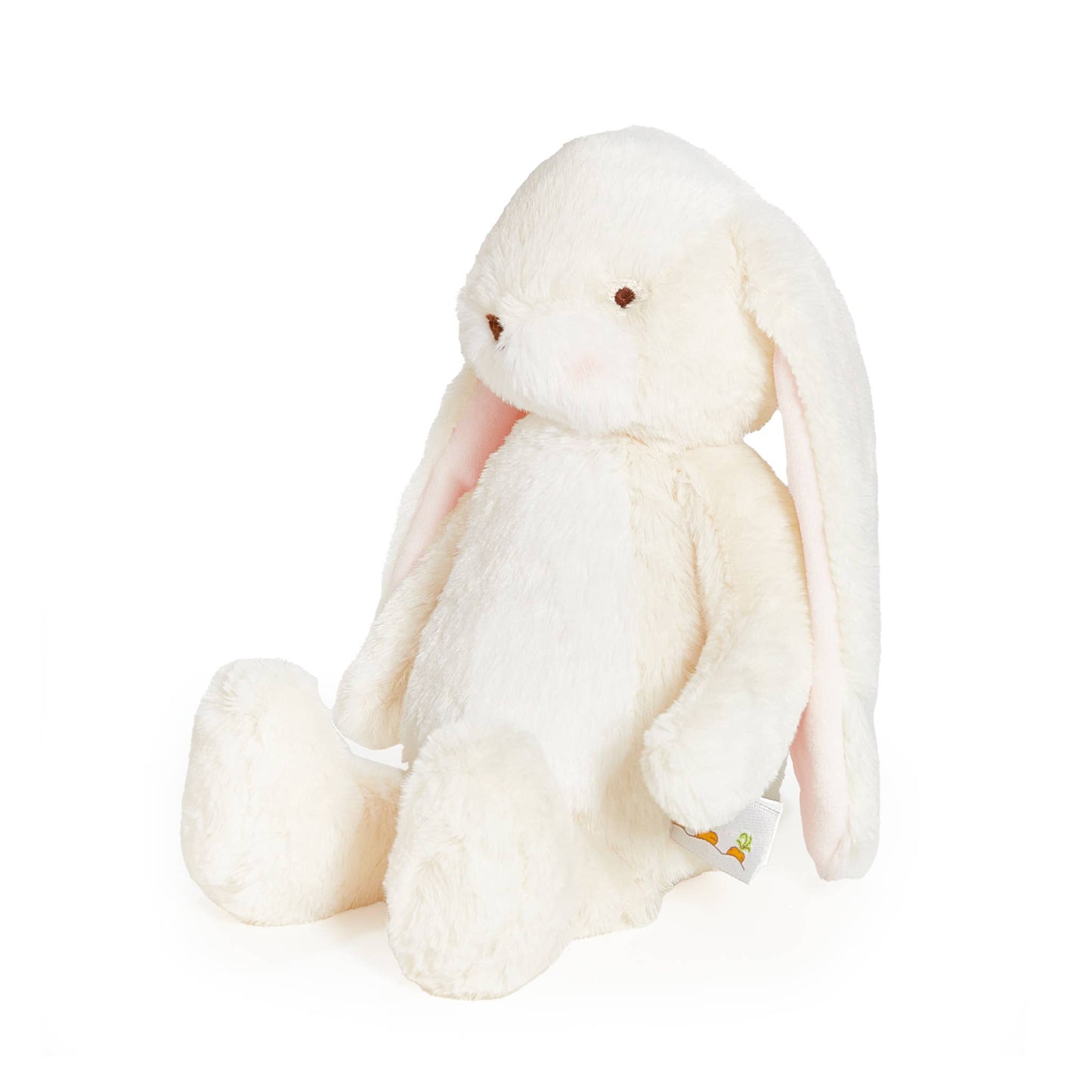 White plush bunny toy on a white background