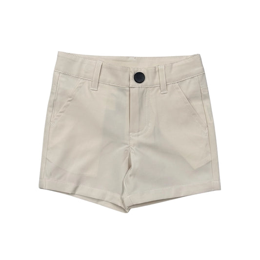 Beige shorts with a black button 