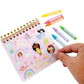 Notebook with stickers and colorful crayons on a white background