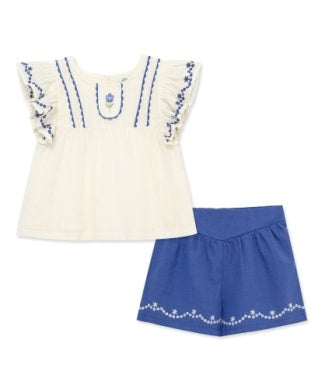 White blouse with blue embroidery and matching blue shorts 