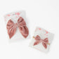 Two pink velvet hair bows 