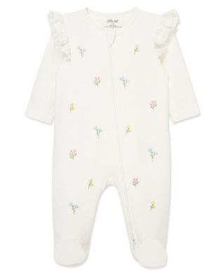 White baby onesie with colorful floral pattern 