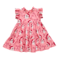 Pink dress with Christmas-themed pattern