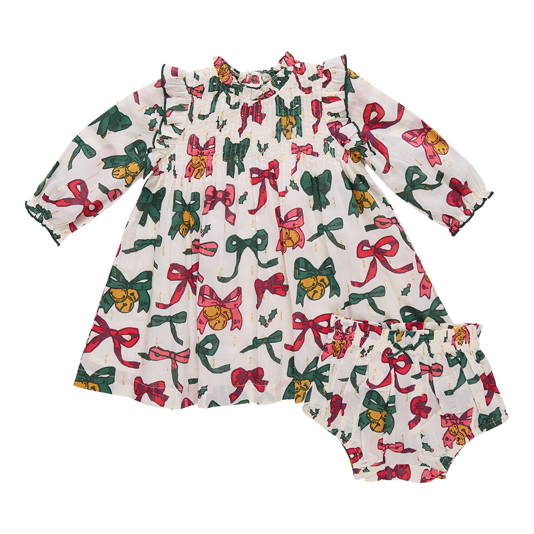 Children's dress with colorful bow pattern 