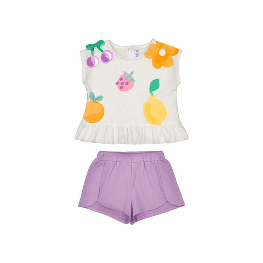 Children's outfit with a white top with fruit designs and purple shorts