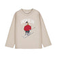 A beige long-sleeve crewneck sweatshirt featuring a graphic of a cartoon snow bear skiing with the text 'SNOWBEAR' 