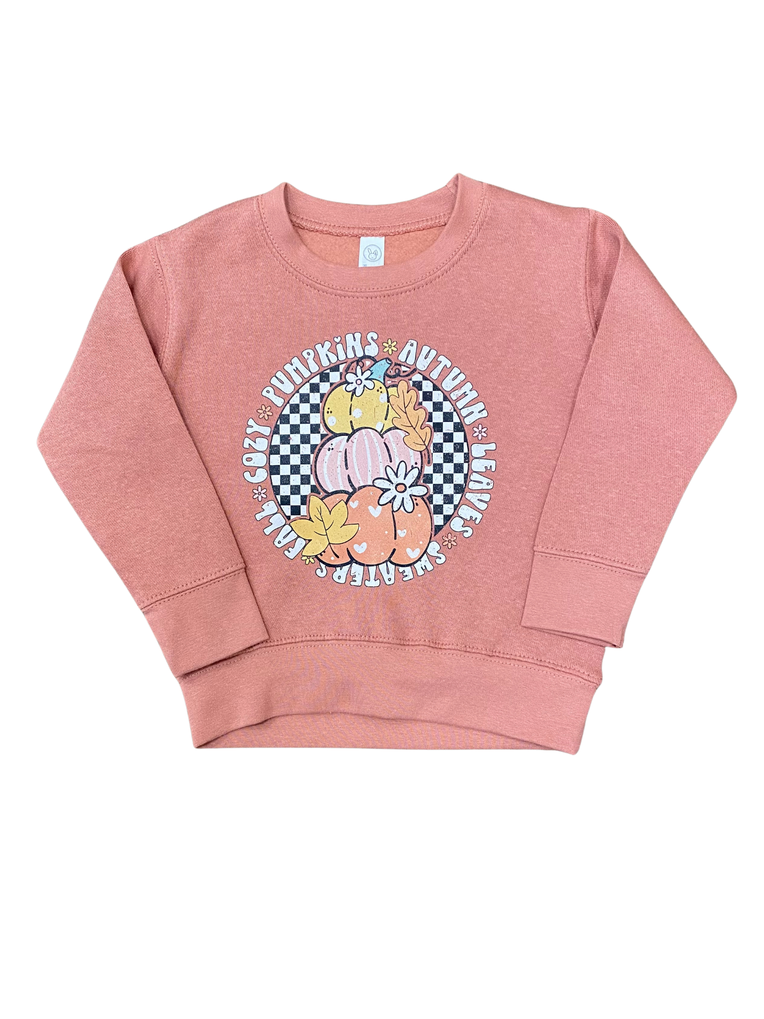Pink sweatshirt with autumn-themed design.
