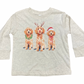 Long-sleeve shirt with three cartoon dogs wearing Christmas accessories