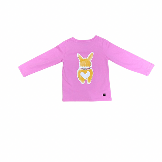 A pink long-sleeve children's top featuring a cartoon corgi graphic on the chest, displayed flat against a plain white background.