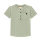 Light green short-sleeve henley shirt with brown buttons