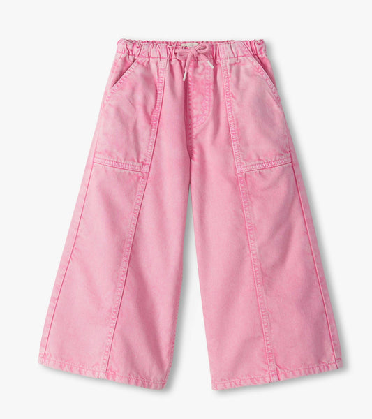 Pink wide-leg cropped pants with an elastic waistband and side cargo pockets, shown flat on a light gray background.