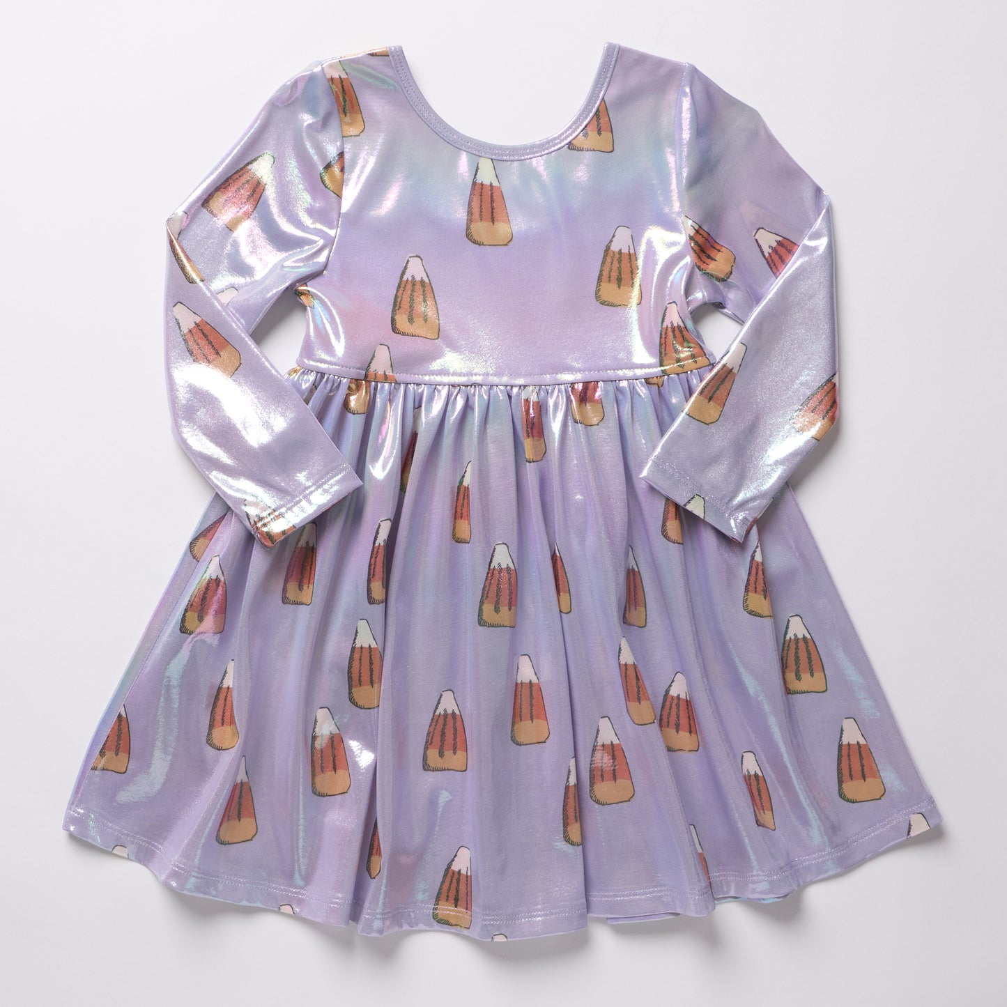 A long-sleeve iridescent lavender dress with an allover candy corn print