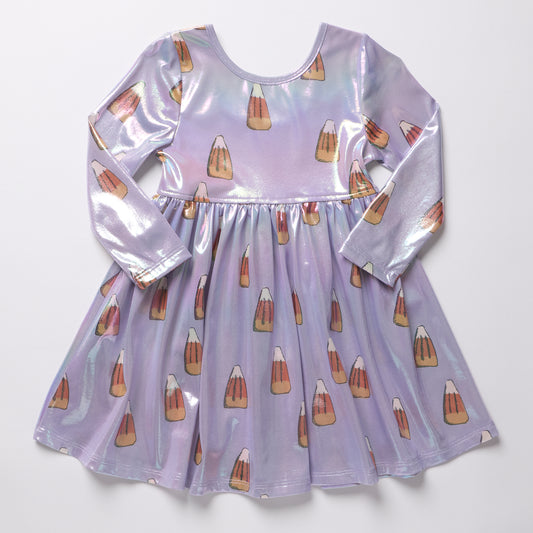 A long-sleeve iridescent lavender dress with an allover candy corn print