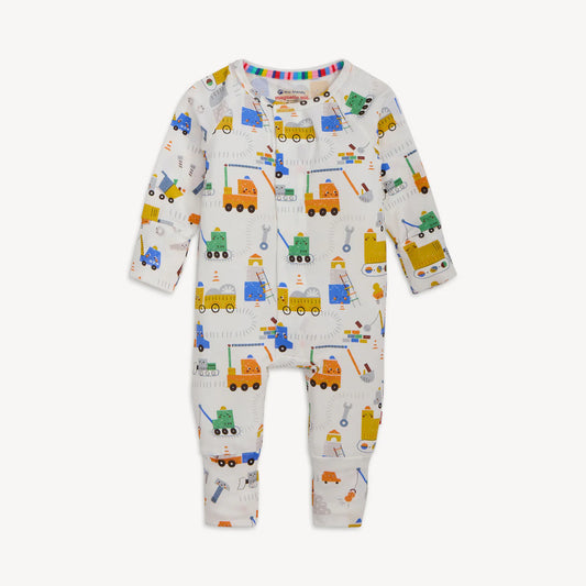 Construction vehicles in multiple colors on white pajama