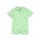 Green baby romper with golf-themed print on a white background