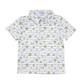Children's polo shirt with baseball themed print on a white background