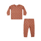 Red children's pajama set with candy canes