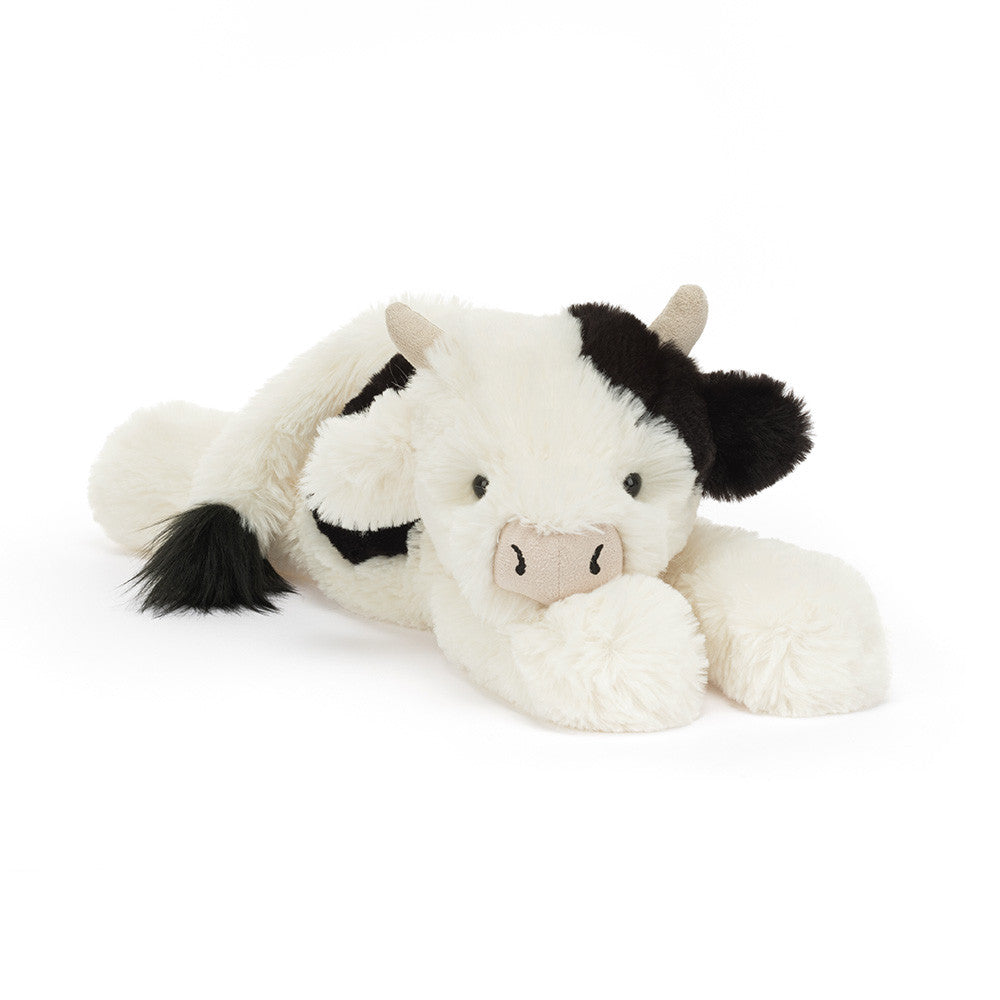 Plush black and white cow toy 