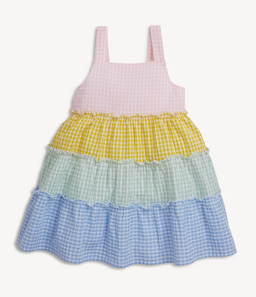 Colorful gingham dress with pink top, yellow middle, and blue bottom on a white background