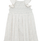 White dress with floral pattern and ruffled sleeves