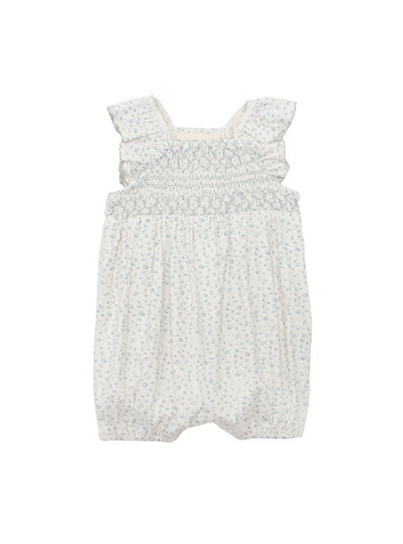 White baby romper with subtle pattern
